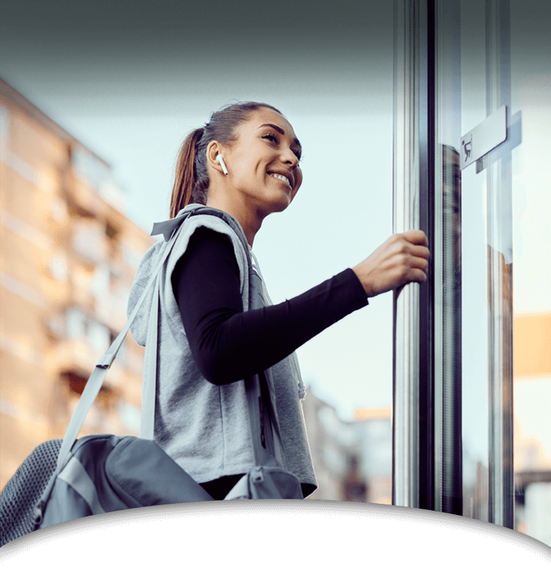 Woman entering gym